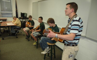 Wawasee School Board Receives Guitar Demo